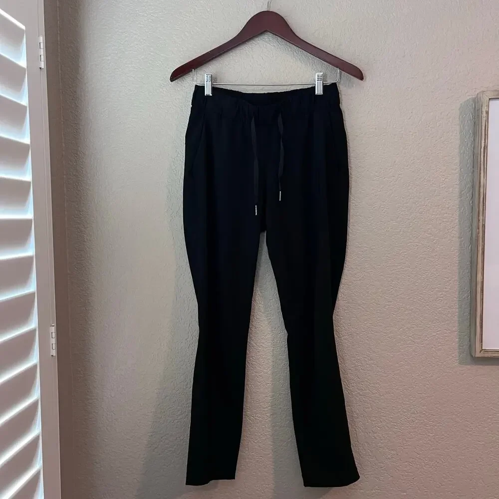 Lululemon On The Fly Black Pants Size 4 Women’s Elastic Waist Side Pockets - Picture 2 of 7
